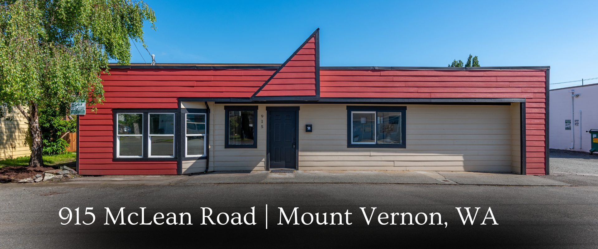 Turnkey standalone commercial building in Mount Vernon, WA with high-visibility road frontage and fresh exterior paint.